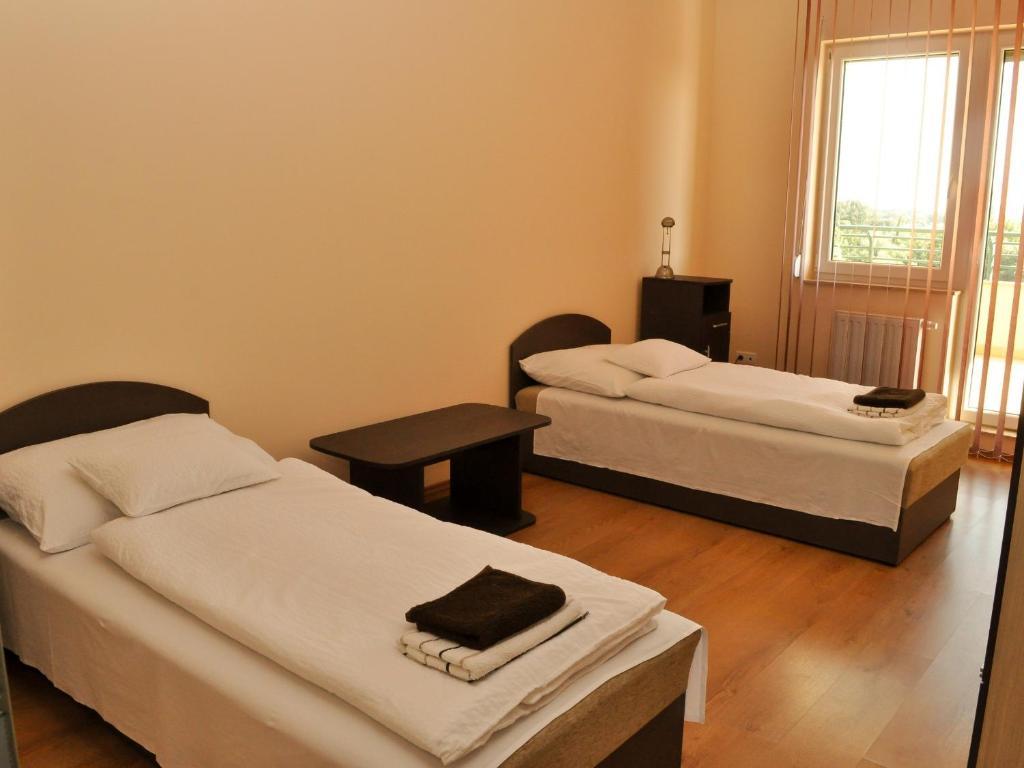Tisza Palota Apartmanok Szeged Værelse billede